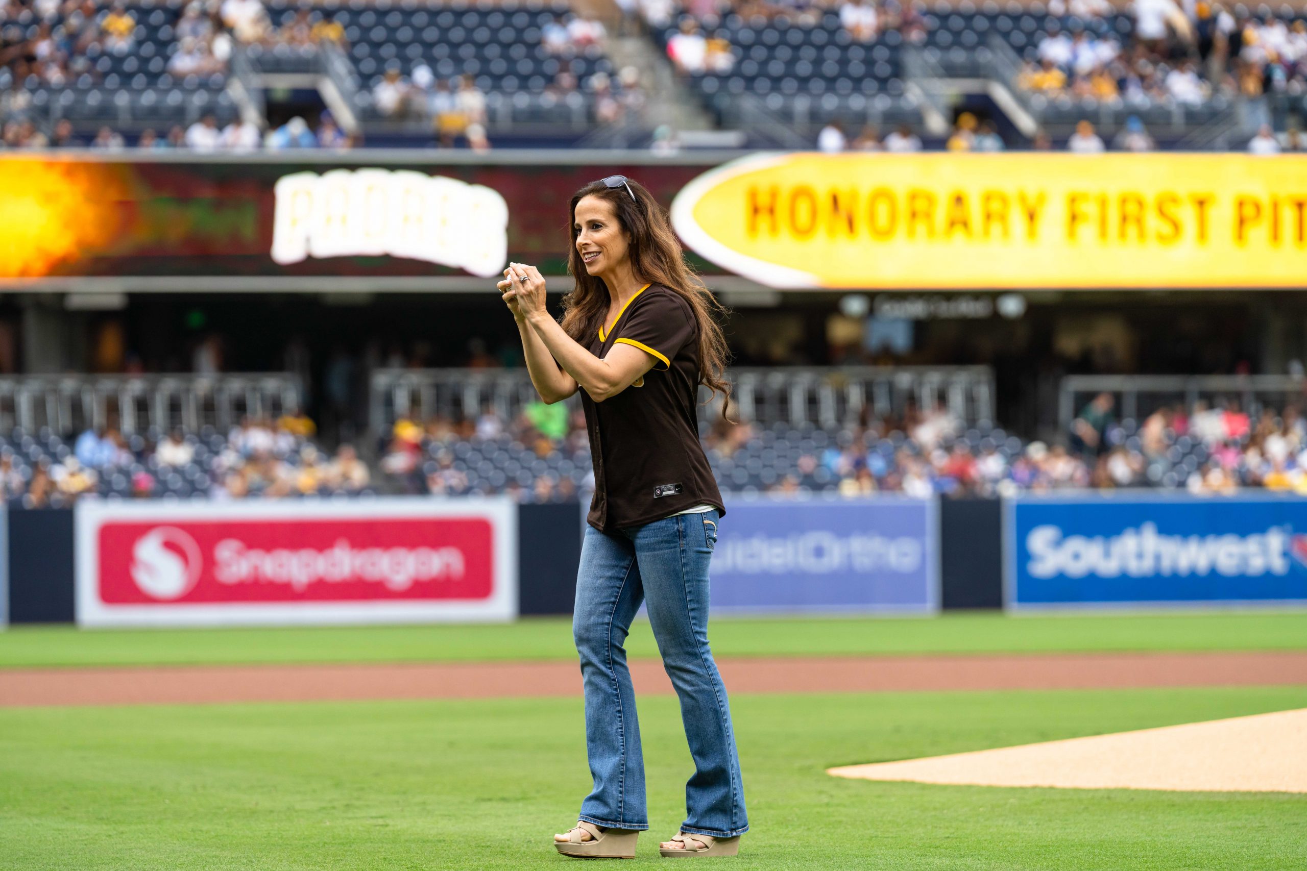 SAN DIEGO, CALIFORNIA - JULY 11: The honorary first pitch before the game against the Toronto Blue Jays at Petco Park on July 11, 2026 in San Diego, California. (Photo by Andrew Seidler/San Diego Padres)